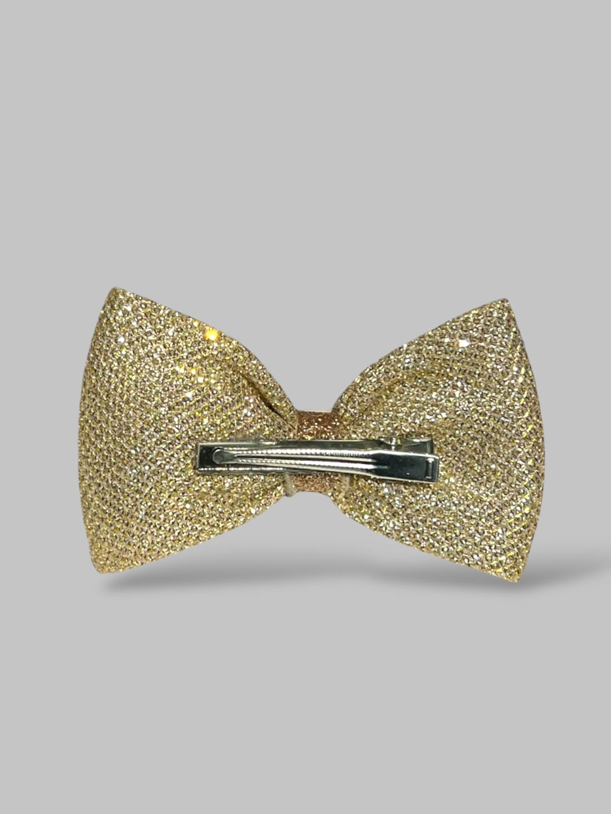 Golden shimmer bow pin