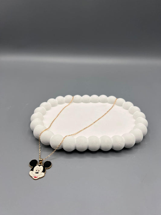 Mickey Mouse & Daisy Duck pendant. pendant necklace with a gold-toned chain and a black and white enamel pendant