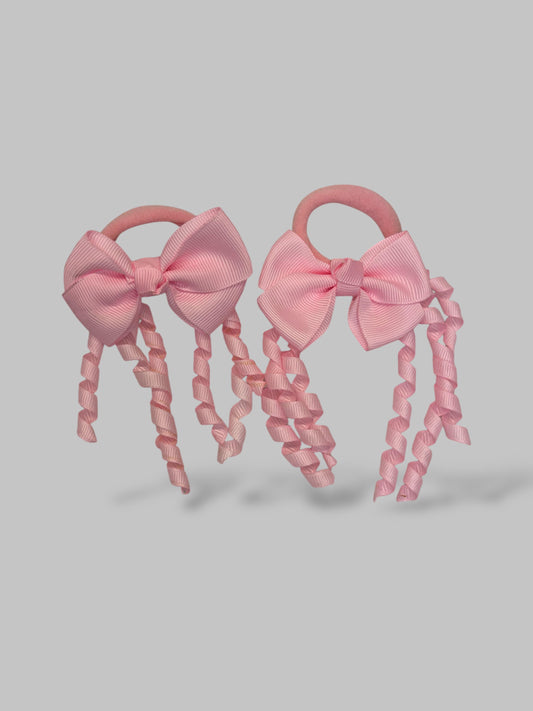 Spiral bow ponies pair